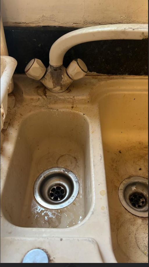 Kitchen sink before cleaning